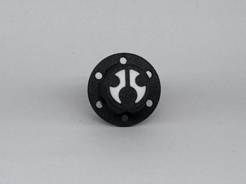 SCX6 Hub Axial Logo