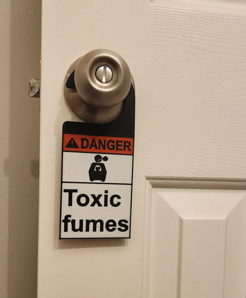 Toxic Fumes Bathroom Sign