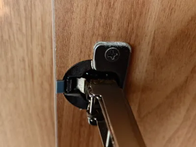 Furniture cabinet door hinge maximum opening angle limiter