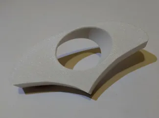 Book holder with contoured thumb rest