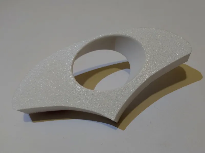 Book holder with contoured thumb rest