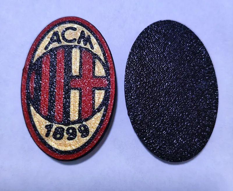 AC Millan badge