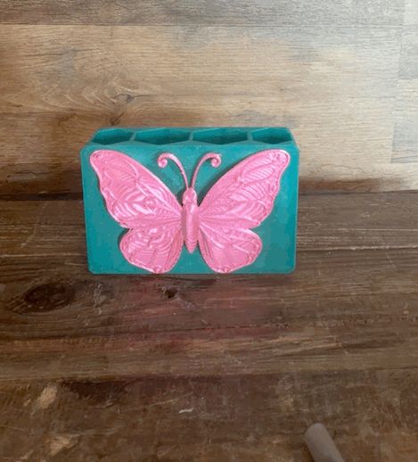Butterfly pen/makeup holder