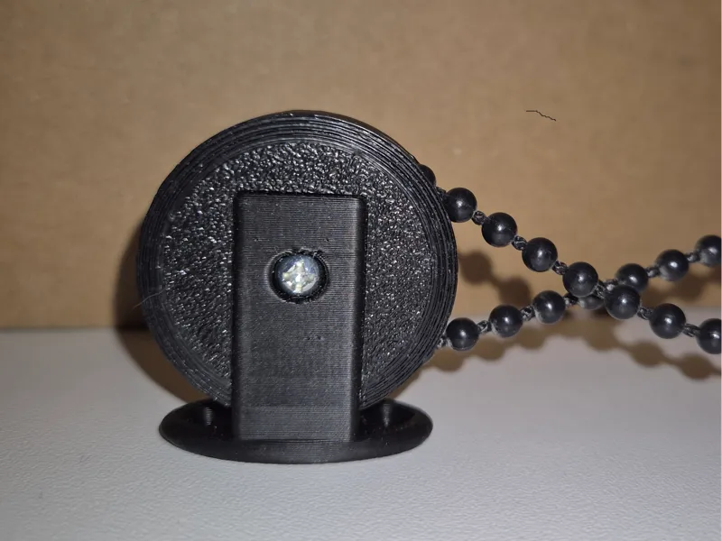 Wall mount for bead chain to blinds.