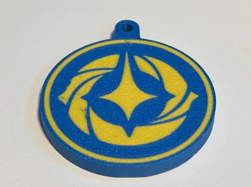 Lorcana logo keychain