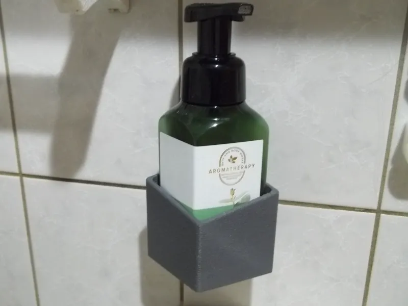 Holder for liquid hand soap bottles