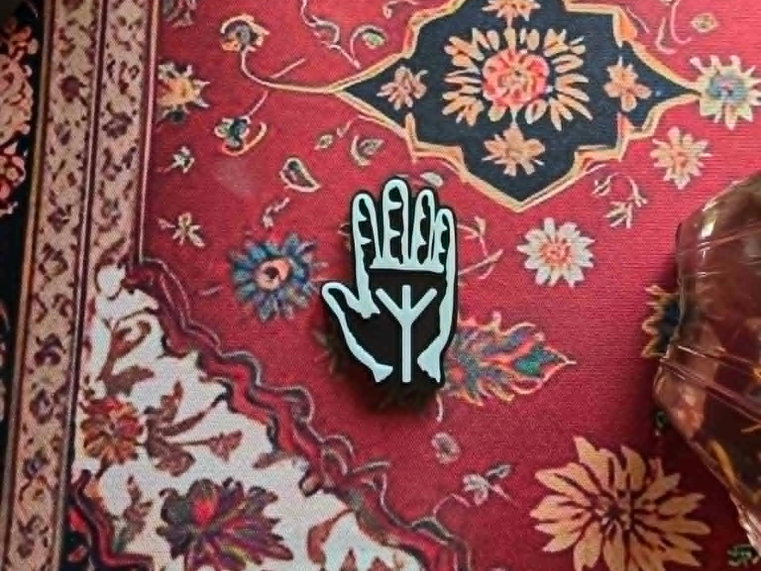 A Hundred Drums Hand Charm