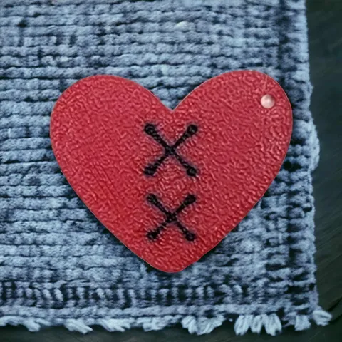 Heart with stitches earrings