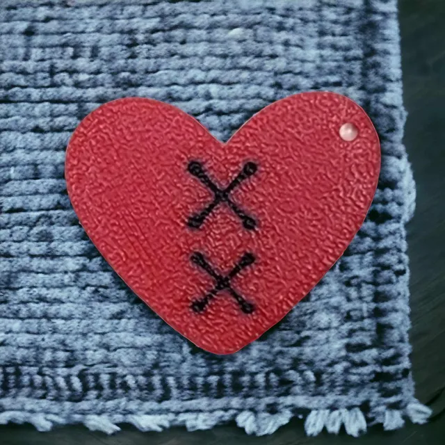 Heart with stitches earrings