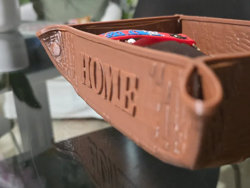 Svuota tasche chiavi portafoglio e altro
