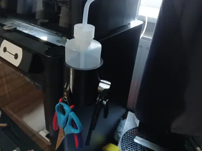 Holder for pliers and a 6cm bottle 