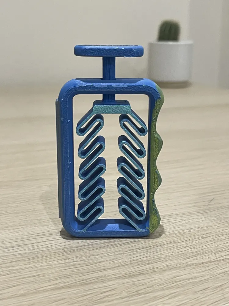 Ergonomic Fidget Toy (Print in Place) - Free 3D Print Model - MakerWorld