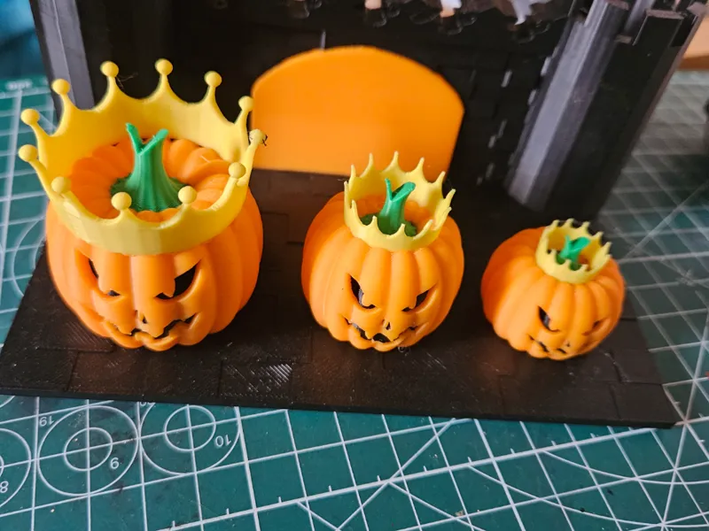Royal pumpkin Family outside spooky castle
