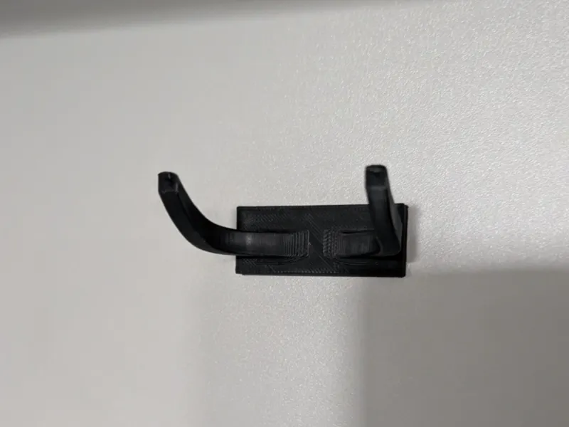 Wall mounted vacuum cleaner head holder