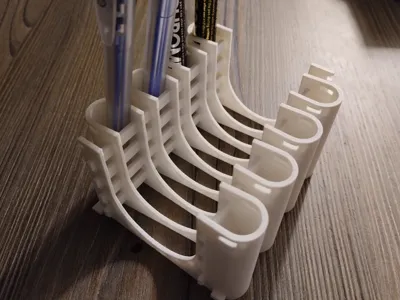 Pen holder in a minimalist parametric style.
