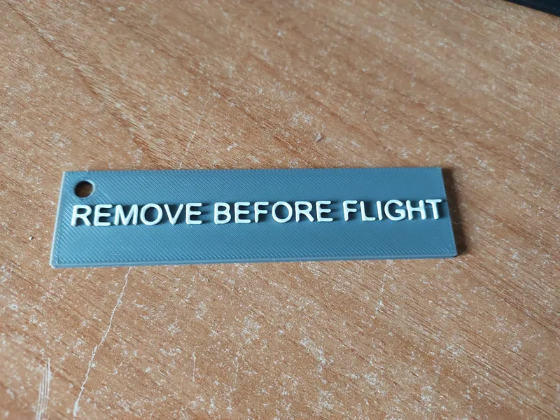remove before flight tag