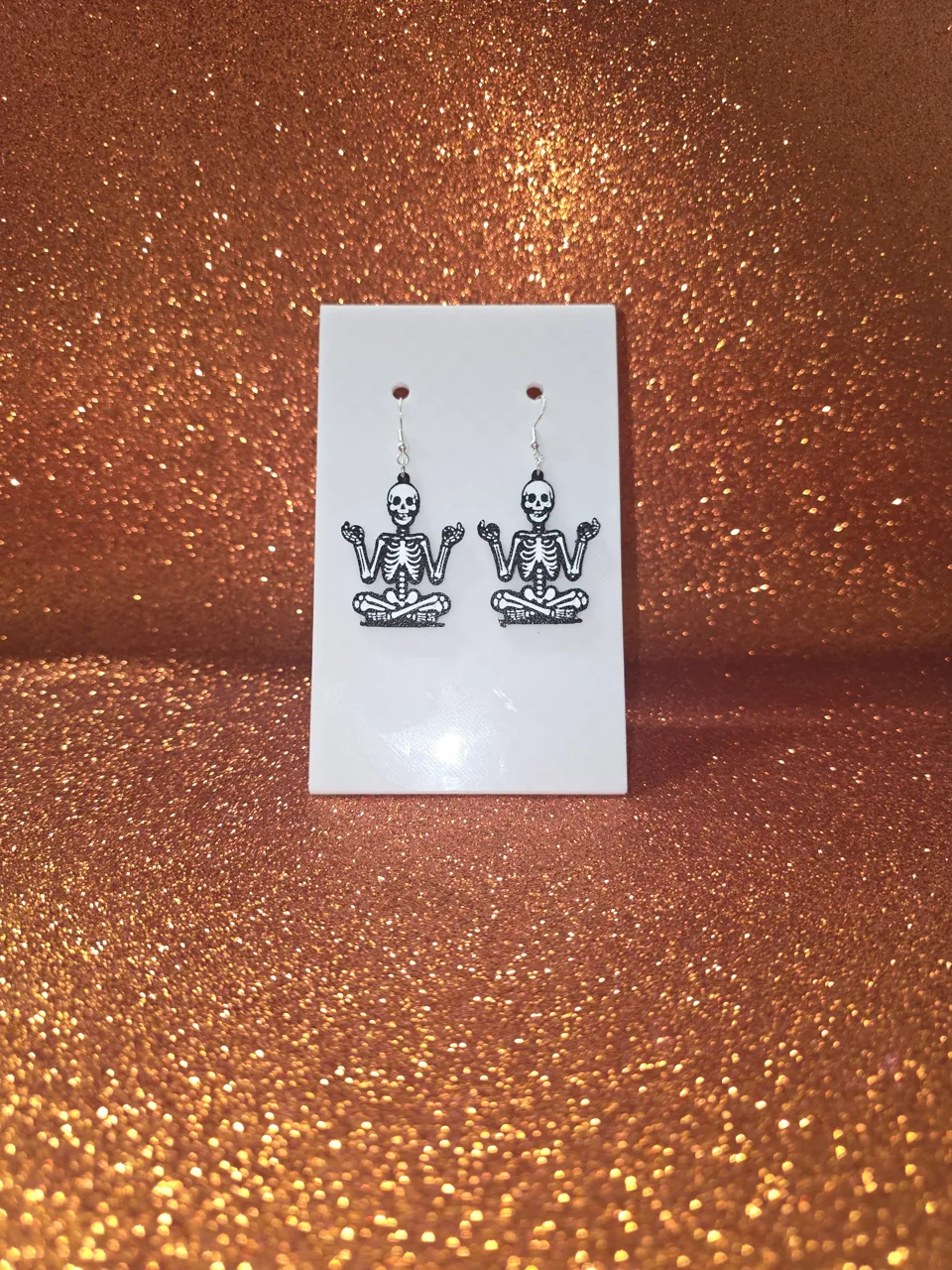 Om crazy skeleton earrings view 2