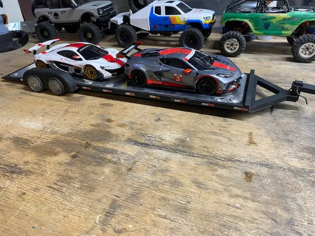 low boy car trailer , hauls car and crawlers 