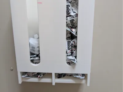 Dishwasher tablet container