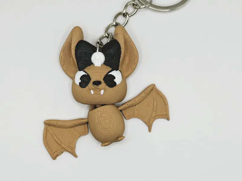 Bat with a bow keychain