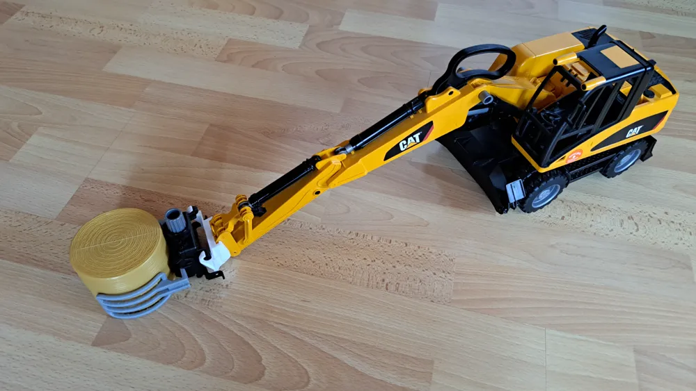 Bagger 597 Adapter für Bagger-Frontlader von schuler87MakerWorld: Kostenlose 3D ...