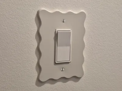 Wavy light switch plate