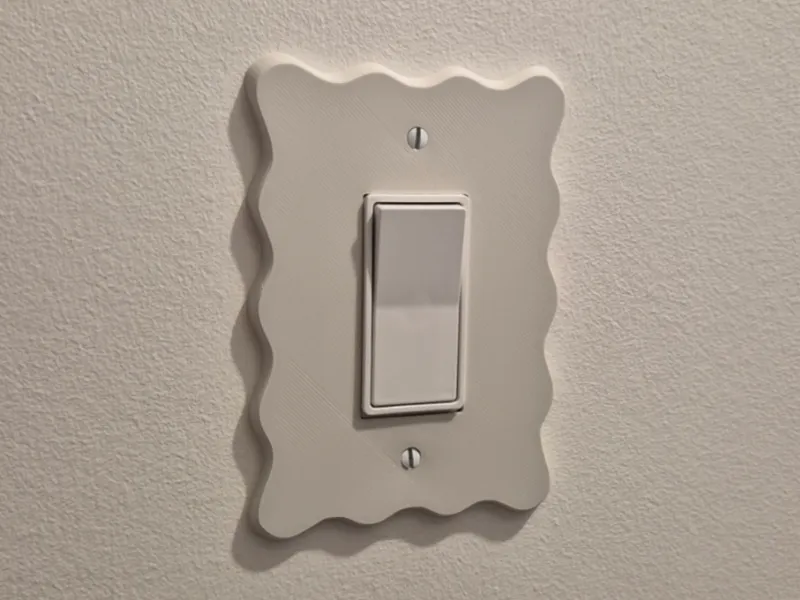 Wavy light switch plate