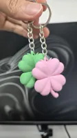 Cleaner front + back, new keychain hole design