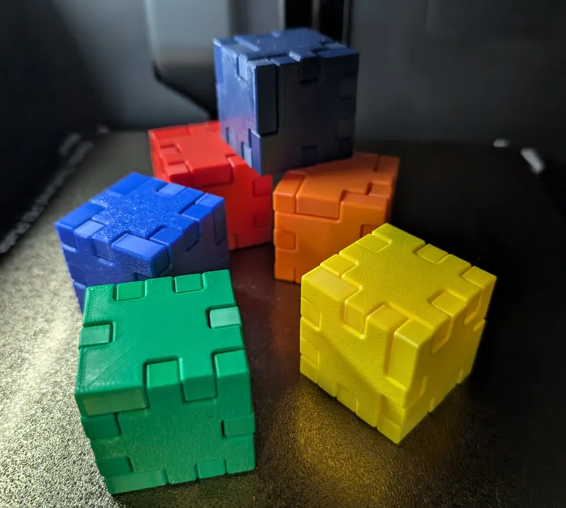 6 colored puzzle cubes 