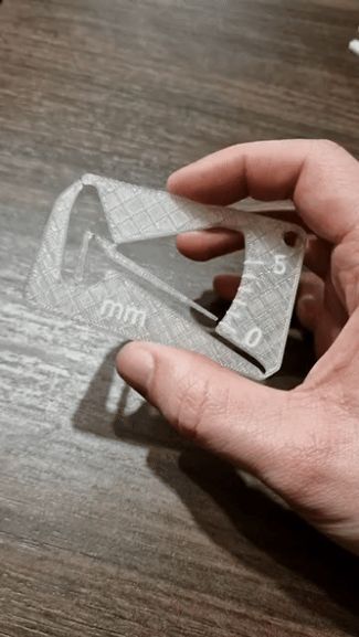 Compliant mechanism caliper