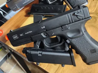 simple handgun(pistol, gun) and magazine stand