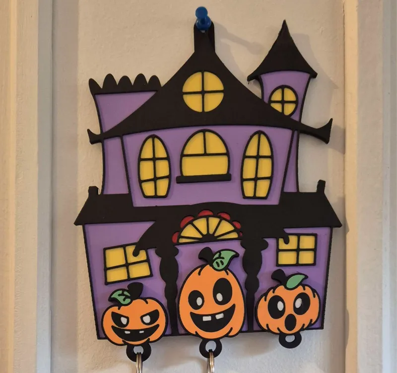 Hanted house with pumpkin keychain