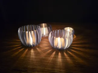 Candle holder for translucent filament