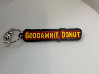 Dungeon Crawler Carl Keychain - GD Donut!