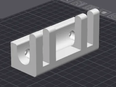 Wall-mounted vacuum nozzle holder