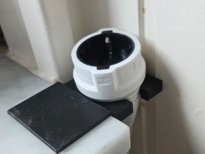 Cable holder for windowsill