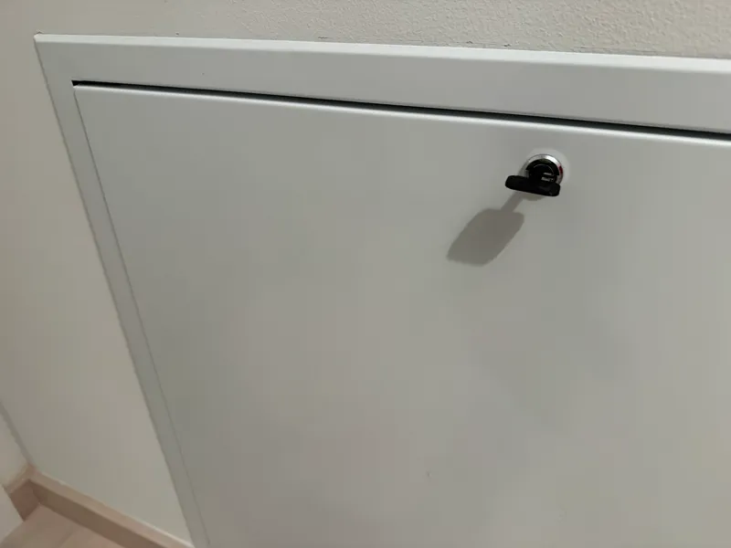 Floor heating distribution frame door key
