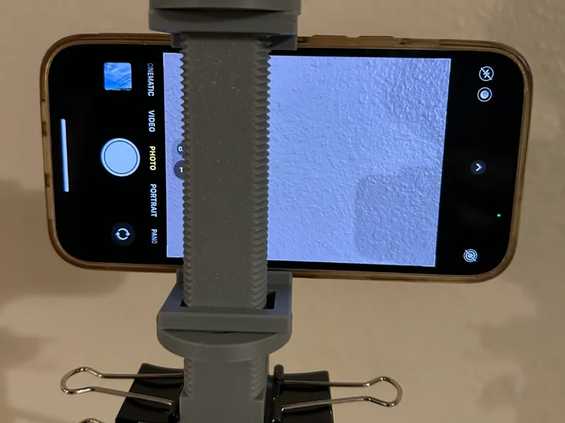 Universal phone holder for tripod(uses gator clip)