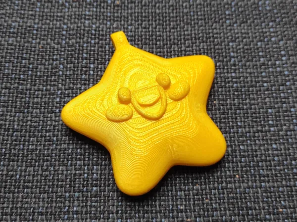 Pendentif étoile souriante
