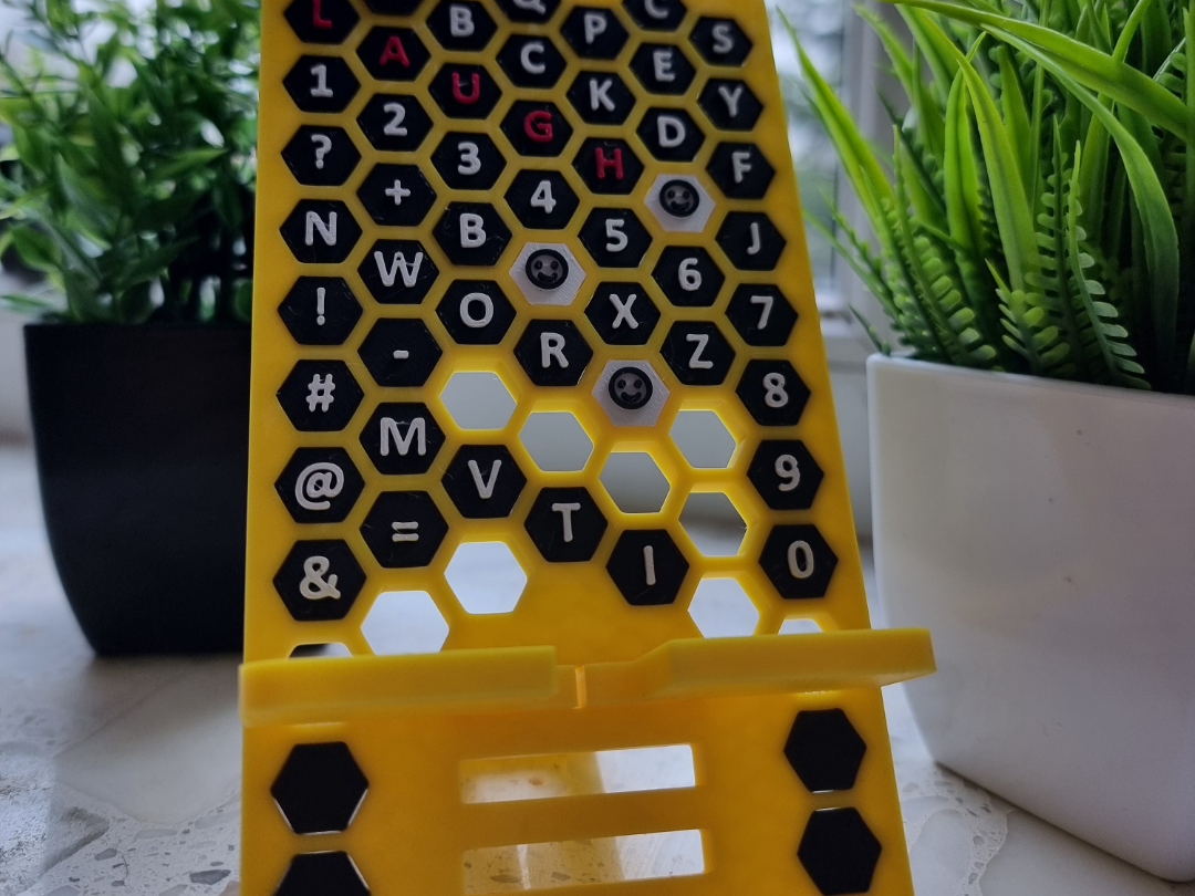 Honeycomb scrabble phone stand