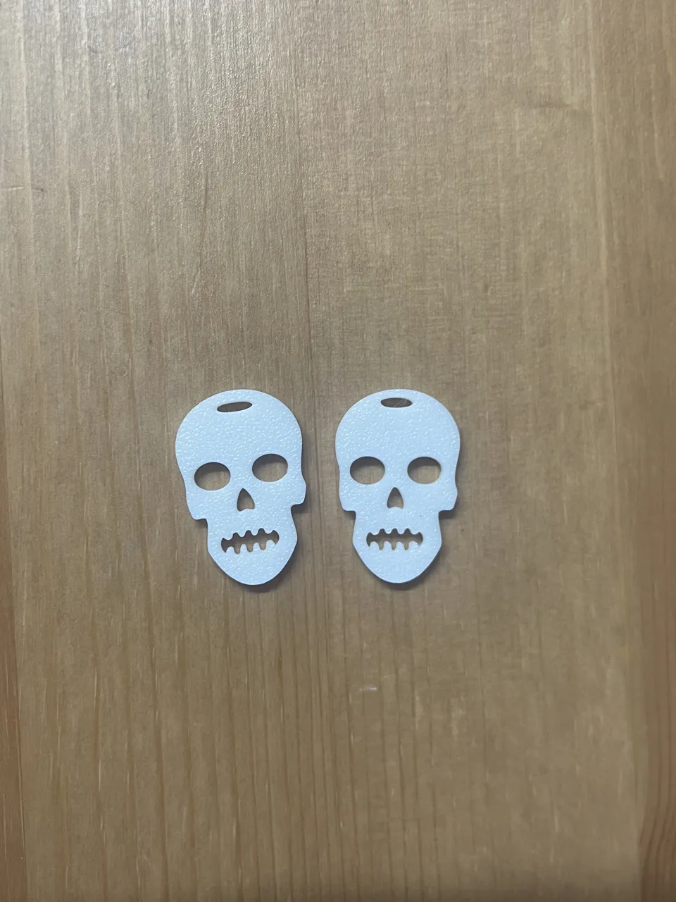 skull earrings view 2