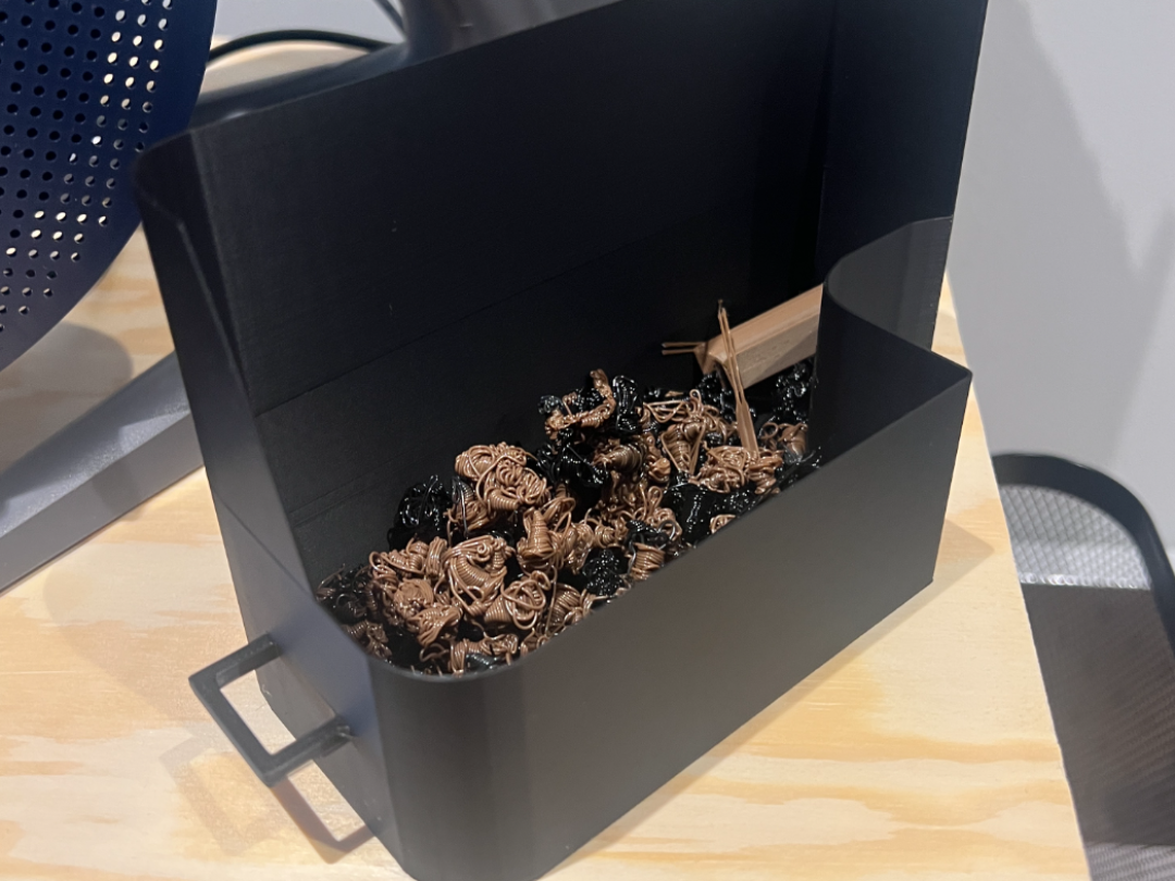 Poop bucket with handle adapted for AMS top mount