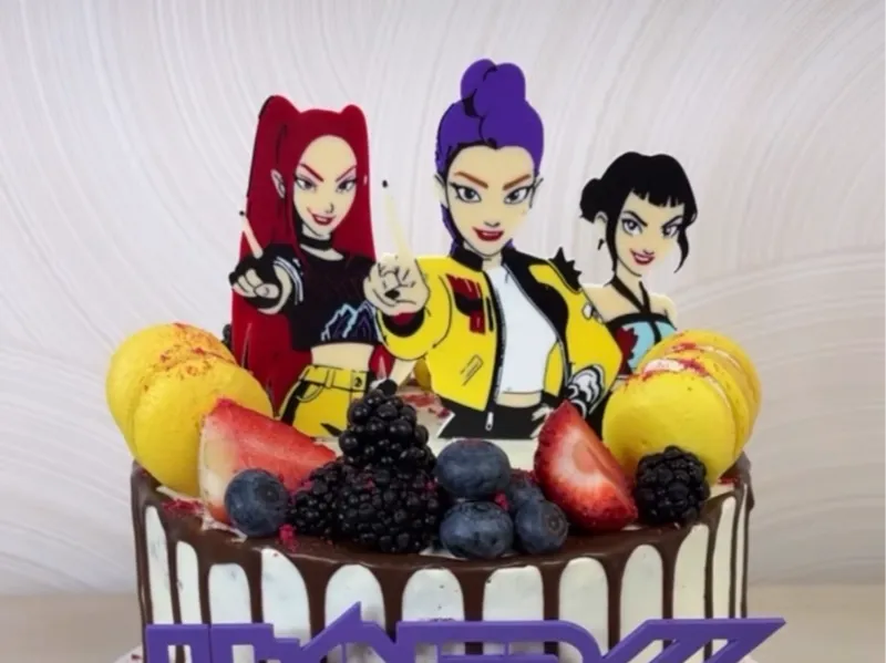 Huntrix cake topper