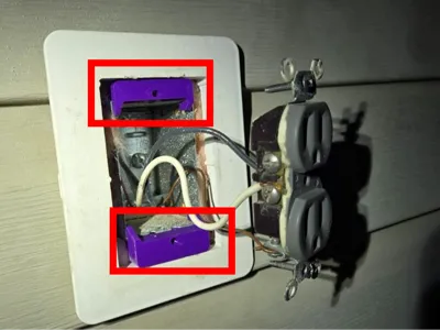 Spacer for power outlet face plate (North America)