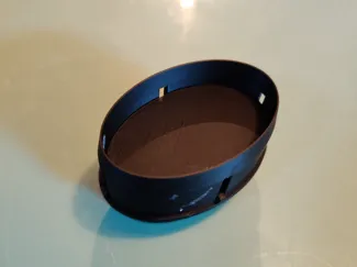 Emporte-pièce avec bouton poussoir pour médaillons