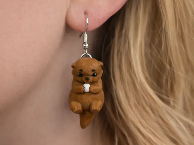 Otter Holding a Rock Earrings