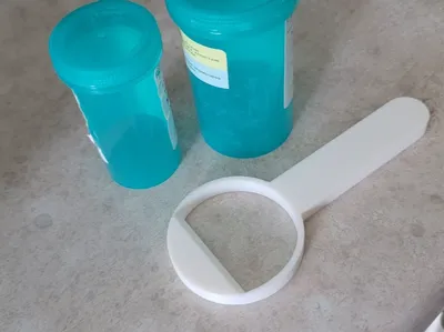 Pill Bottle Opener Lever