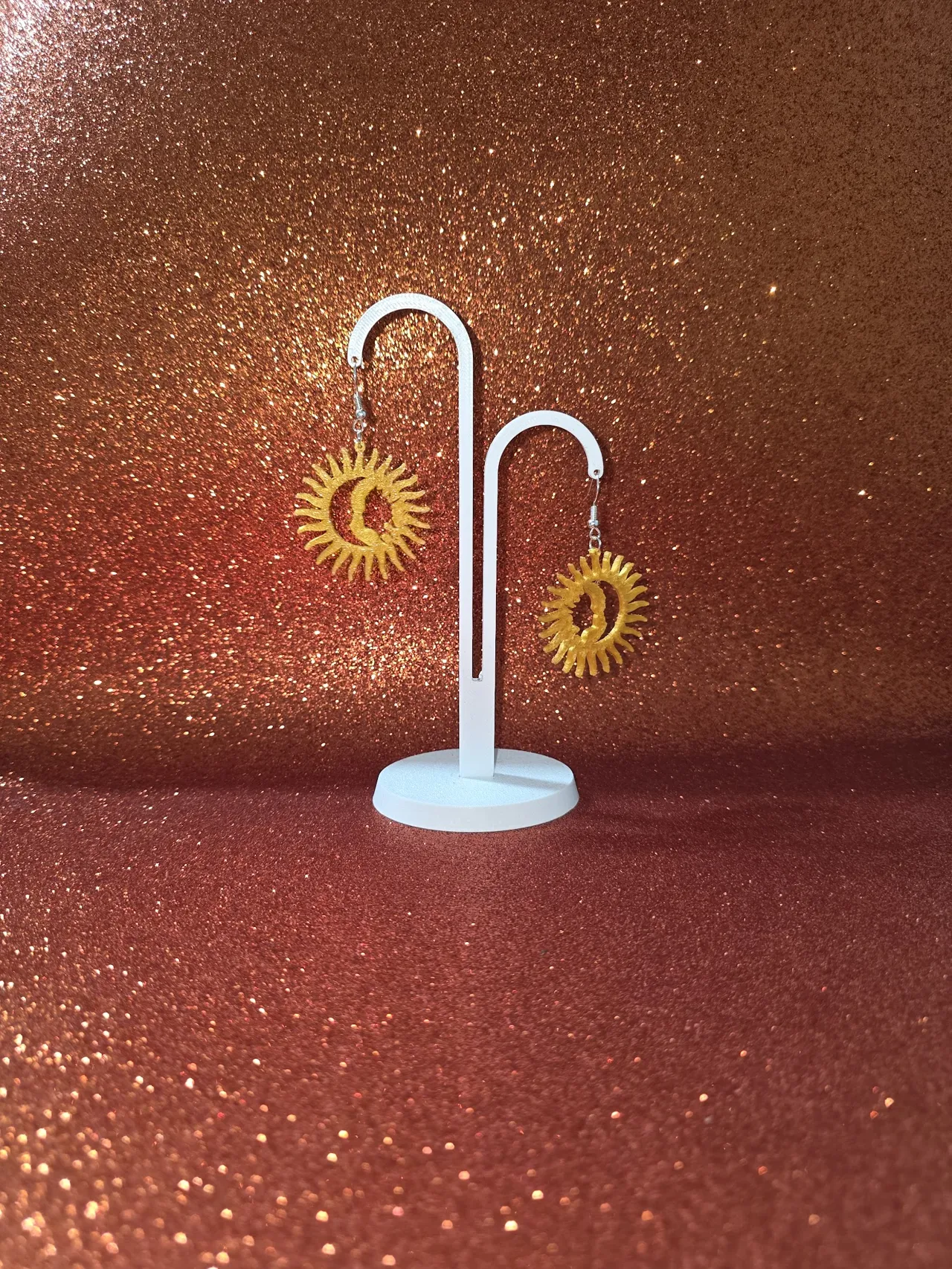 Moon and sun faces earrings view 3