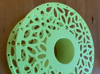 Spool with floral pattern