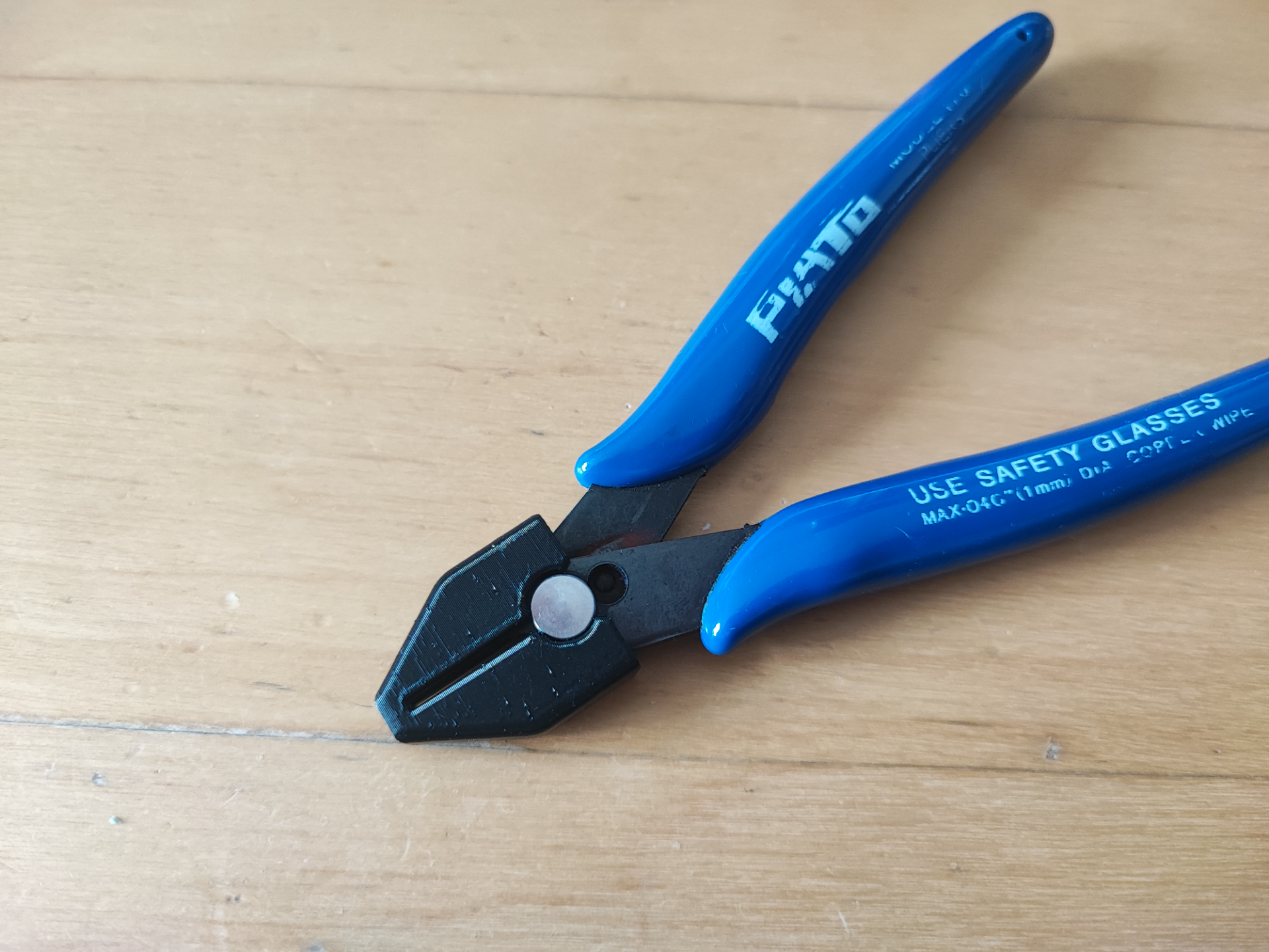 Filament cutter cap
